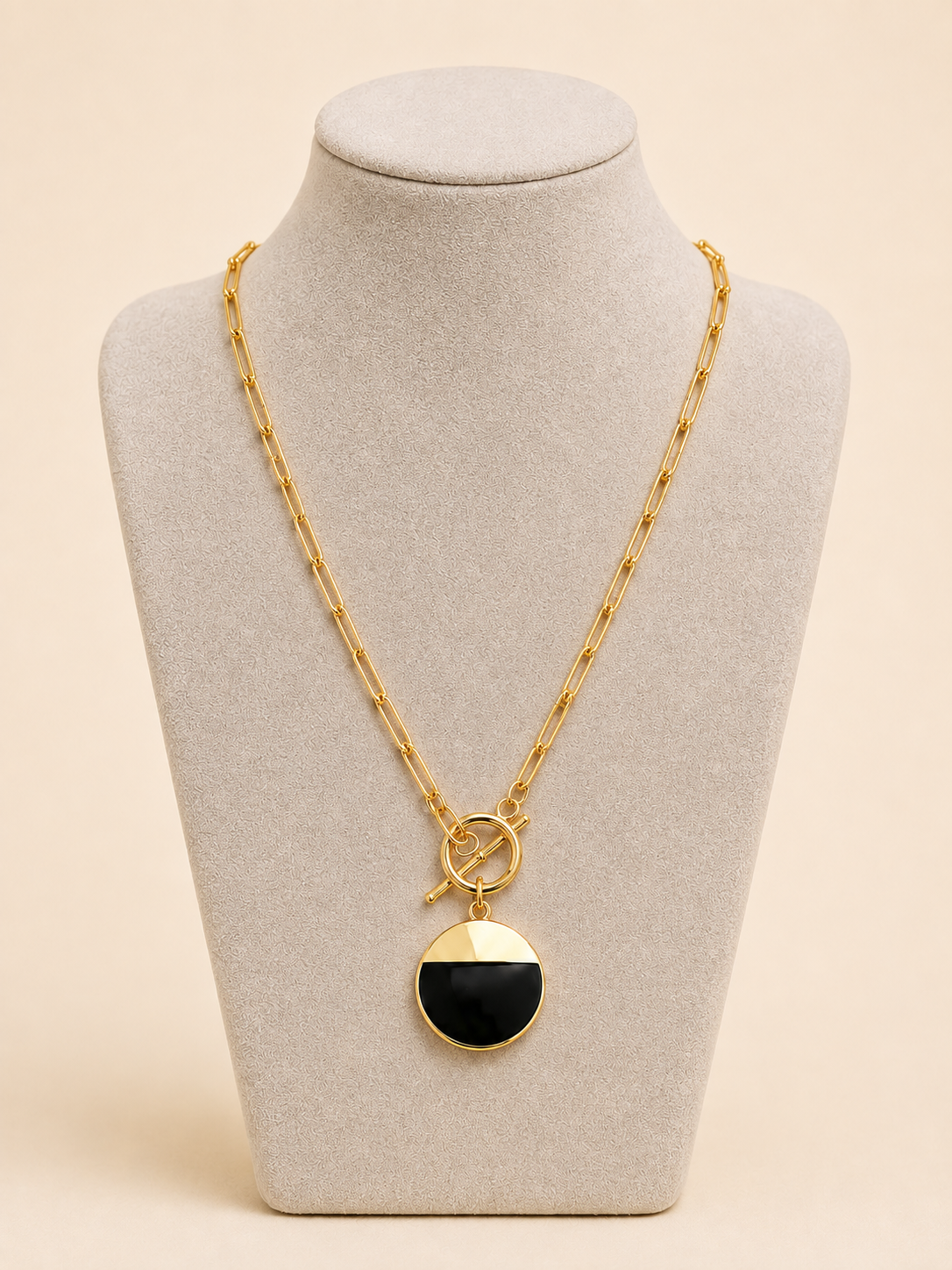 Noir Signet 18K gold-plated pendant necklace showing paperclip chain and adjustable fastening