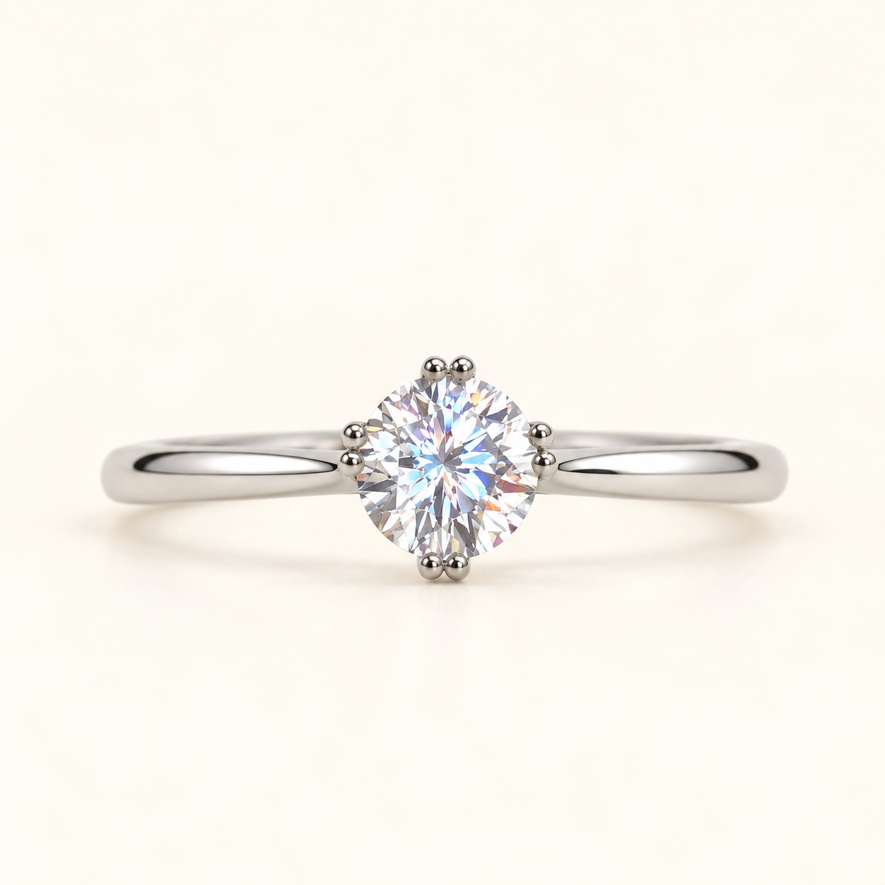 Aurelia round solitaire ring with brilliant round-cut centre stone and polished silver-tone band