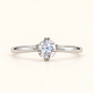 Aurelia round solitaire ring with brilliant round-cut centre stone and polished silver-tone band