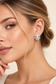 Model wearing Celeste Crystal Sunburst Earrings