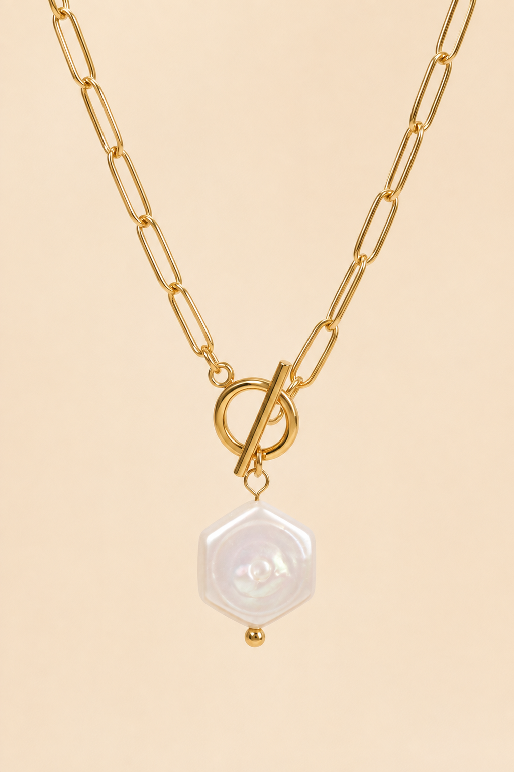 Celeste gold paperclip chain toggle necklace with hexagonal pearl pendant
