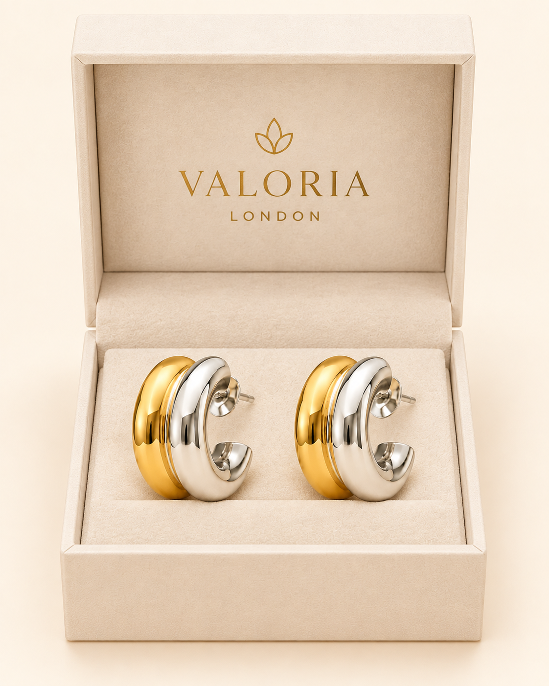 Duet Luxe two-tone gold and silver sculpted hoop earrings presented in a Valoria London jewellery box.