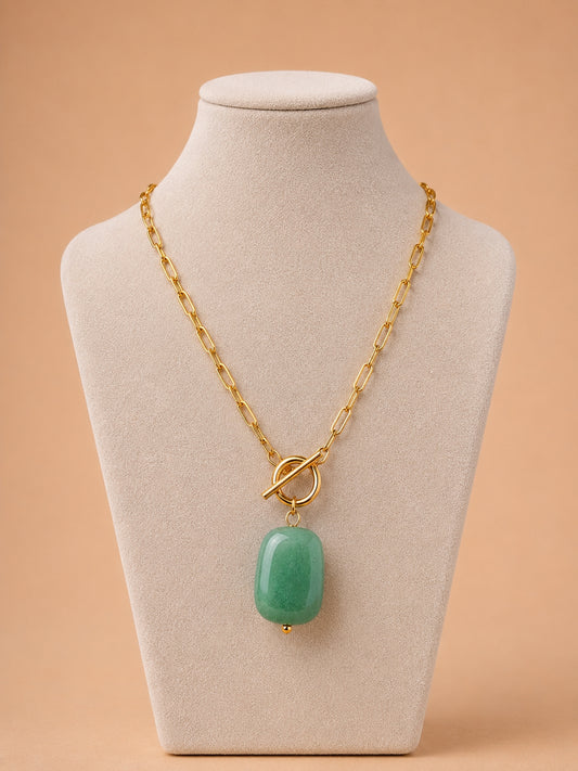 Elara green stone toggle necklace displayed on a jewellery mannequin