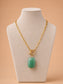 Elara green stone toggle necklace displayed on a jewellery mannequin