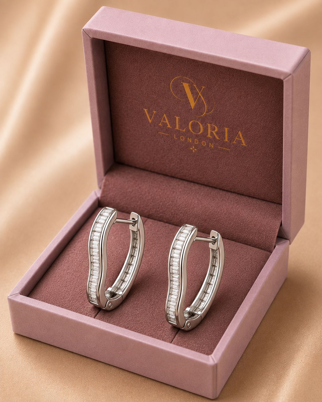 Élodie baguette wave hoop earrings presented in a Valoria London jewellery box
