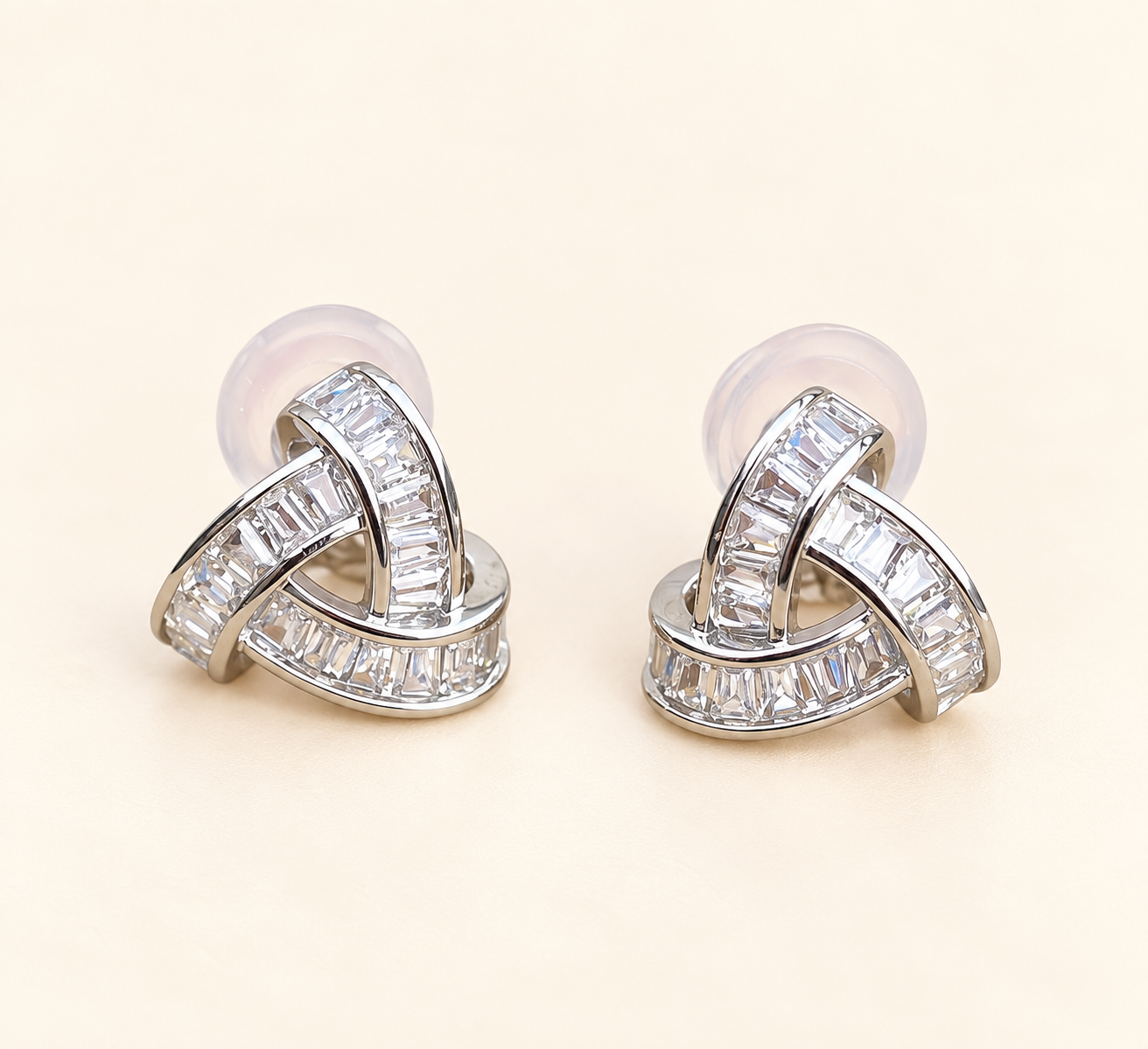 Élodie silver-tone crystal knot earrings with baguette-cut stones