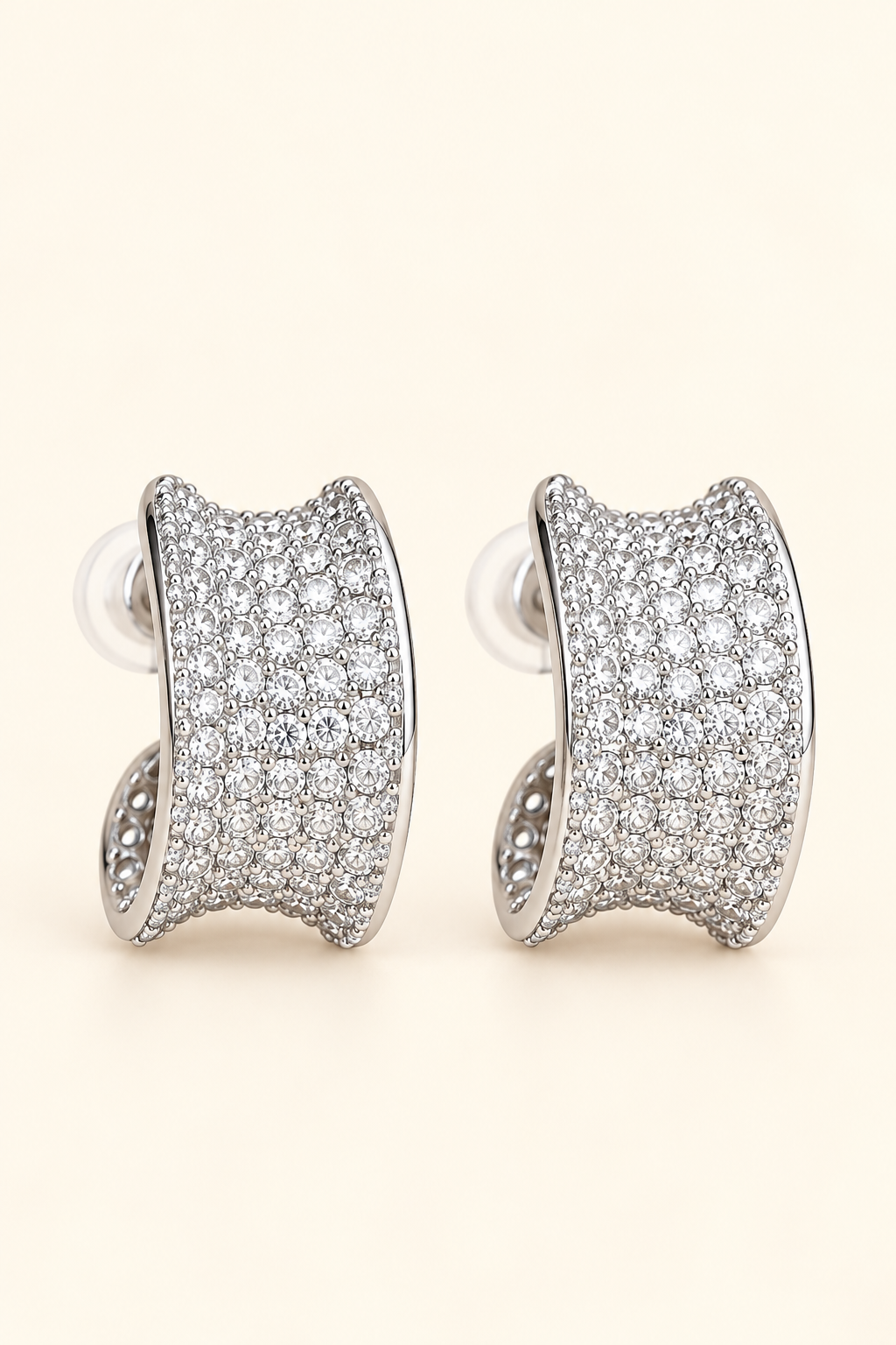Lumière Pavé Curve Earrings with sparkling crystals in polished silver tone