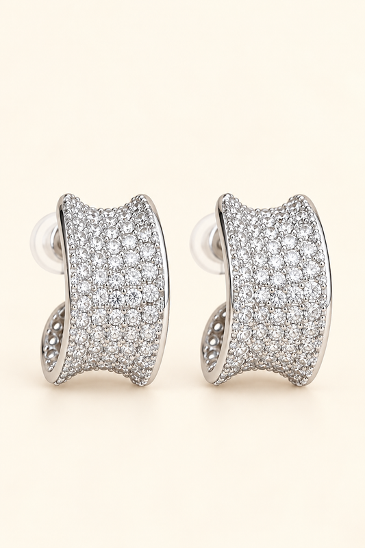 Lumière Pavé Curve Earrings with sparkling crystals in polished silver tone