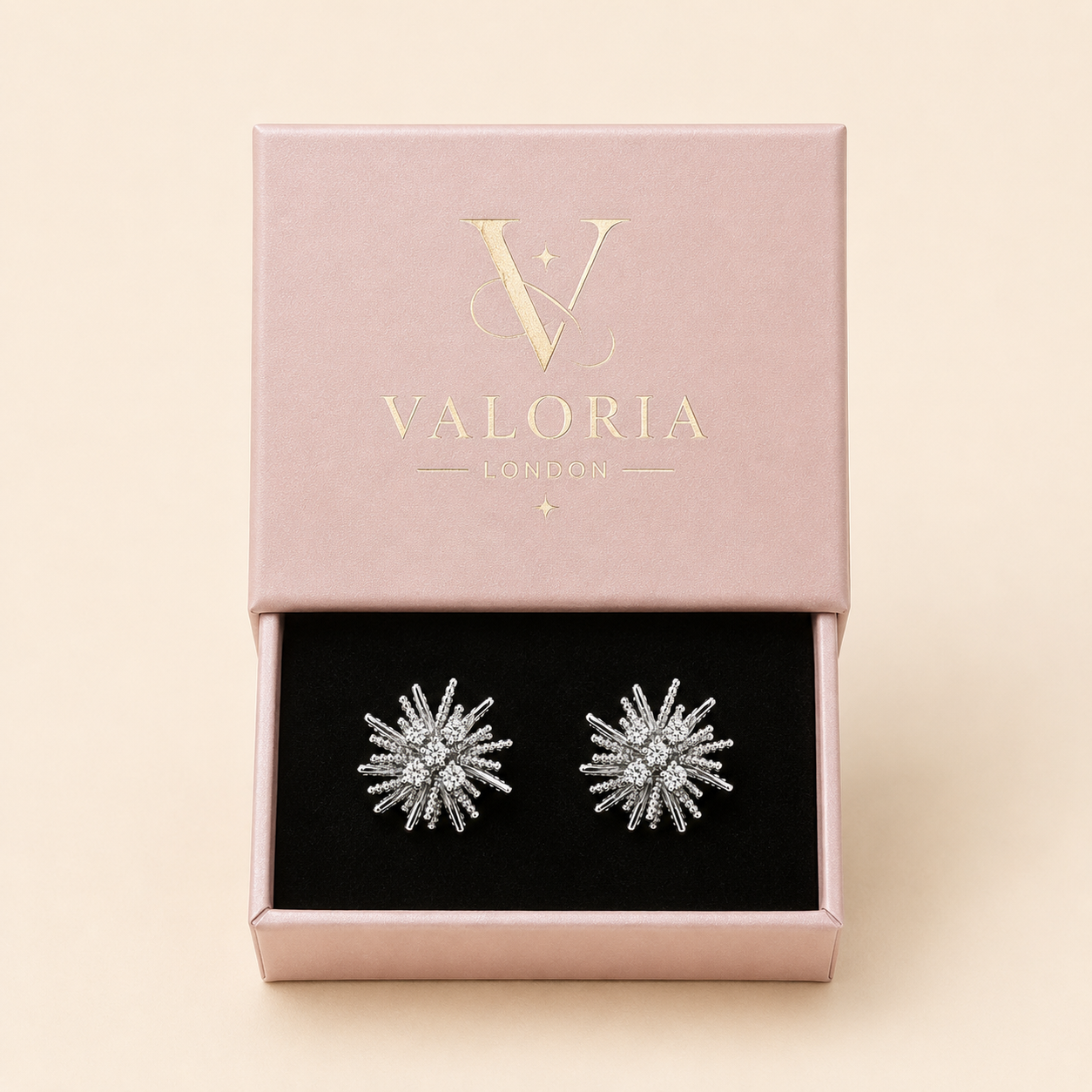 Lumière silver crystal burst stud earrings presented in Valoria London jewellery box