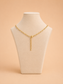 Back view of the Valoria London Elara gold paperclip chain necklace showing the lobster clasp and adjustable extender chain