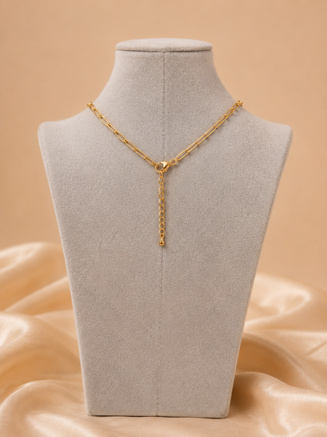 Back view of Valoria London gold paperclip chain necklace showing lobster clasp and adjustable extender chain